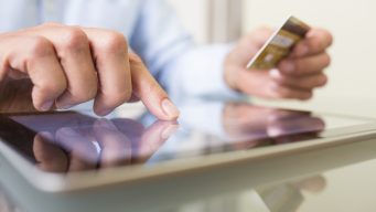 Man using credit card online