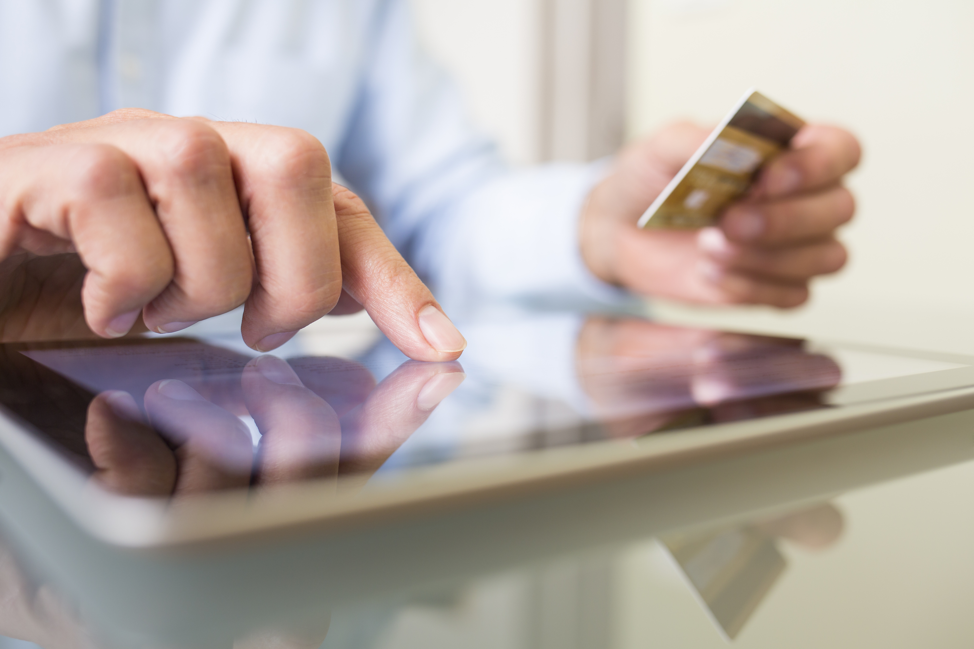 Man using credit card online