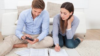 Young couple working on finances